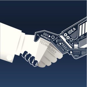A human hand shaking a robotic hand symbolizing collaboration between humans and AI.