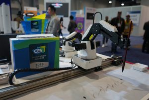 Robotic arm on display at a technology exhibition.
