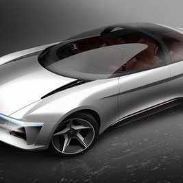 Futuristic silver concept car with sleek aerodynamic design and tinted canopy.
