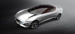 Futuristic silver sports car with sleek aerodynamic design.