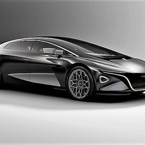 Sleek black futuristic sports car with aerodynamic design and transparent roof.