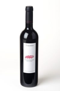 A sleek bottle of red wine with a minimalist label.