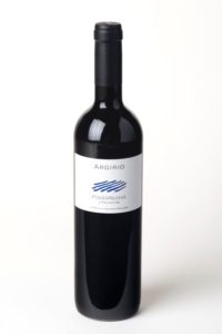 Elegant dark wine bottle with a minimalist white label.