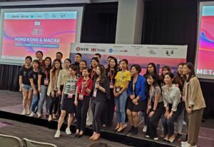 She Loves Tech winners posing on stage