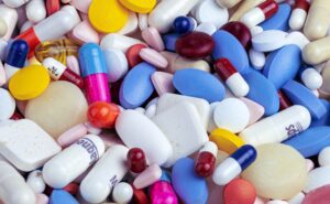 A colorful assortment of various pills and capsules.