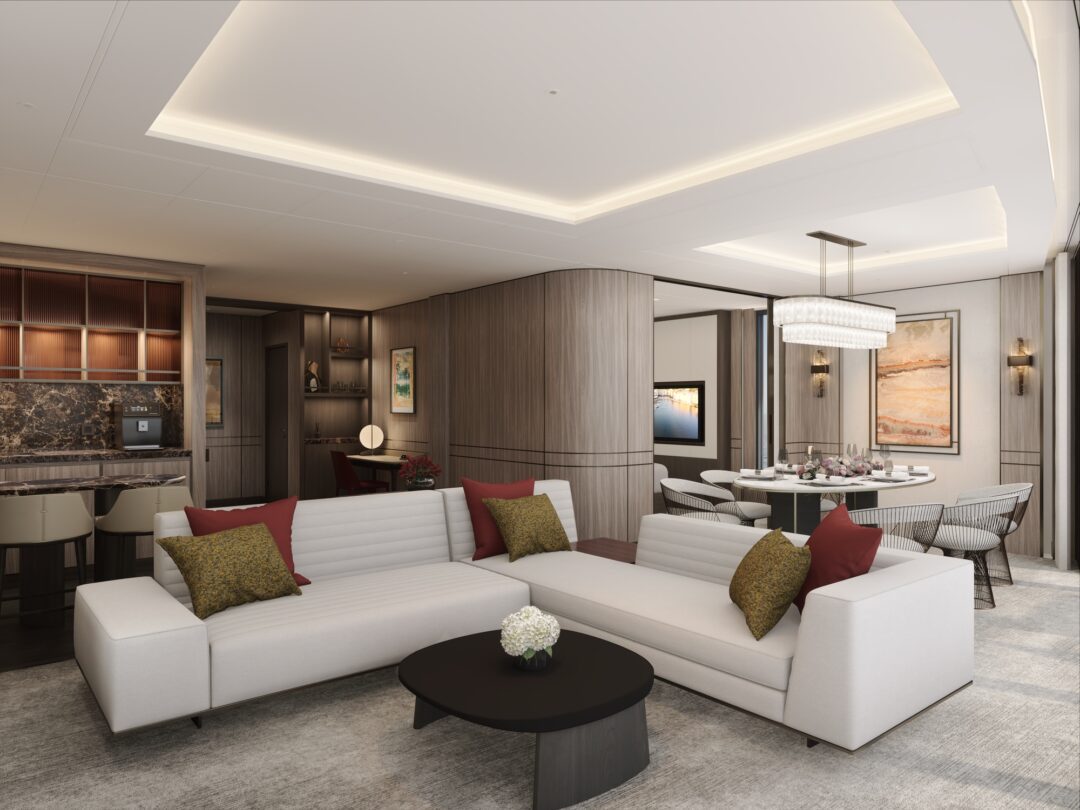 Modern living room with white sectional sofa and elegant dining area.
