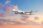Fiji Airways plane flying at sunset with colorful sky.