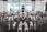 White humanoid robots standing in formation