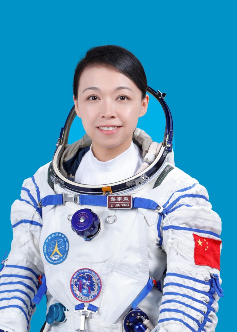 Smiling astronaut in white spacesuit